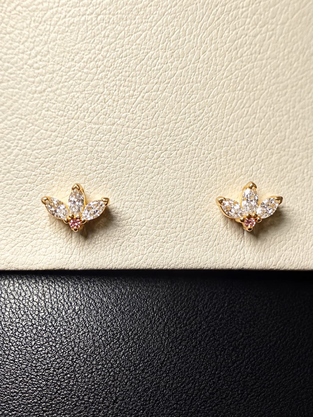 Lotus-inspired marquise diamond earrings with pink diamond centers