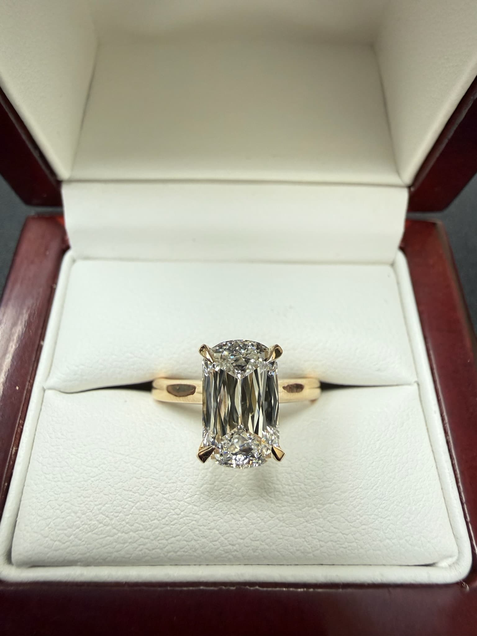 Modified criss cut diamond engagement ring